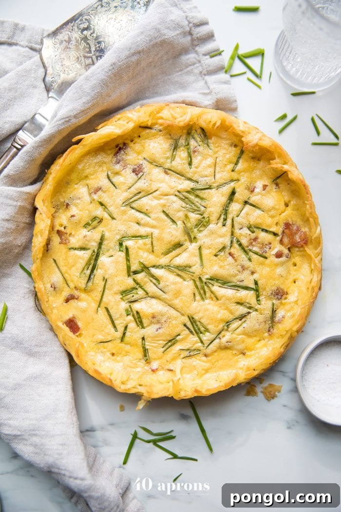 Whole30 quiche lorraine with hash brown crust