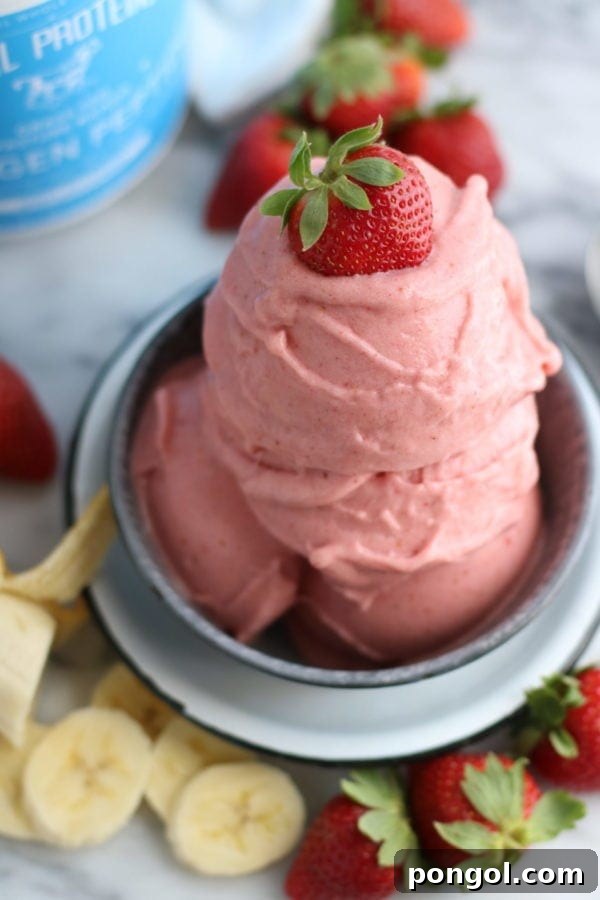 Refreshing strawberry banana nice cream, a simple and healthy frozen dessert.