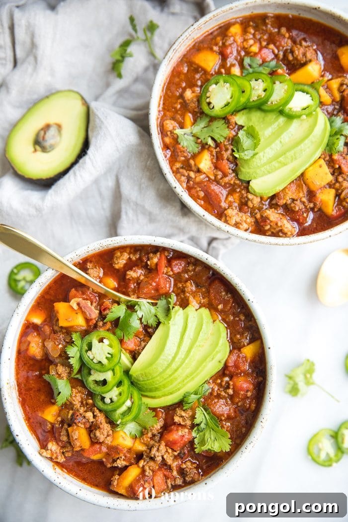 Instant Pot Whole30 Butternut Squash Chili Paleo Low Carb 3 Two bowls of Instant Pot Whole30 chili with butternut squash topped with jalapenos and avocados