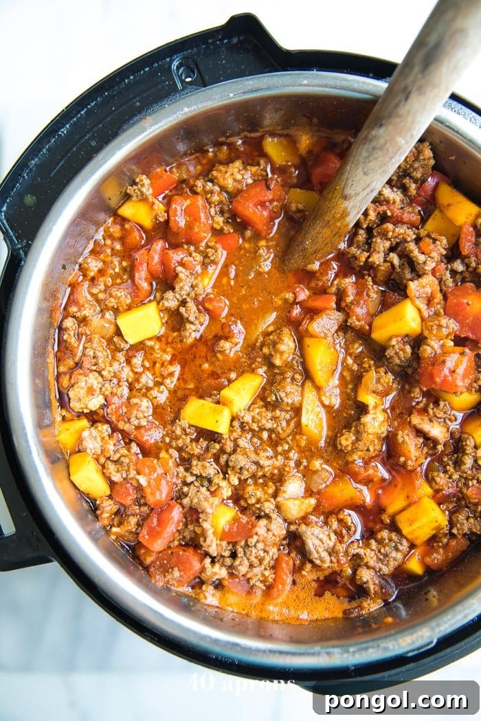 Instant Pot Whole30 Butternut Squash Chili Paleo Low Carb 4 Instant Pot full of Whole30 chili with butternut squash, beef, pork, and tomatoes