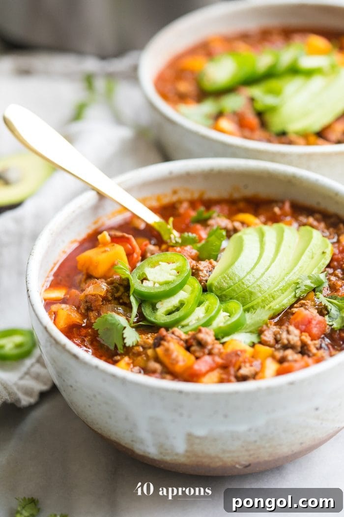 Instant Pot Whole30 Butternut Squash Chili Paleo Low Carb 5 Two bowls of Instant Pot Whole30 chili with butternut squash topped with jalapenos and avocados