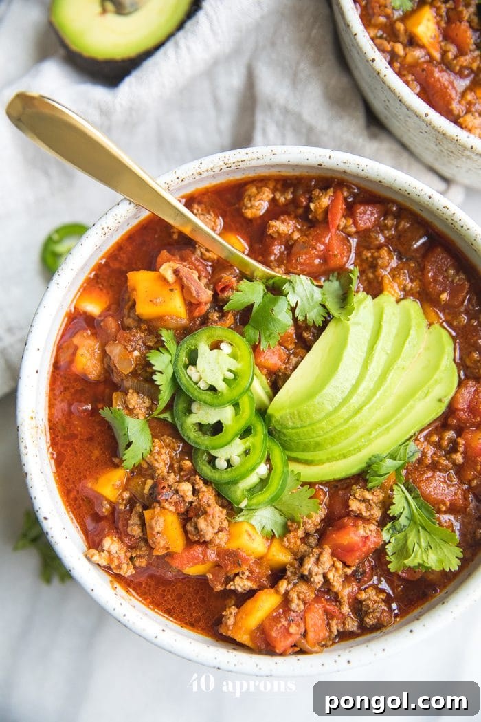 Instant Pot Whole30 Butternut Squash Chili Paleo Low Carb 6 Bowl of Instant Pot Whole30 chili with butternut squash topped with jalapenos and avocados