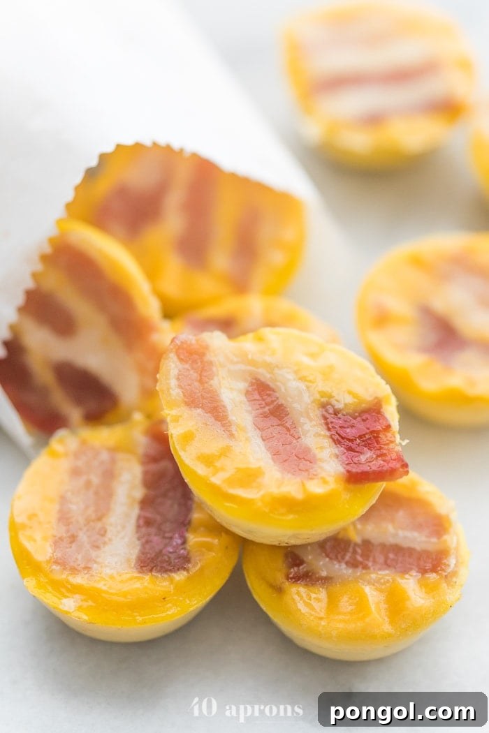 Healthy sous vide egg bites with bacon coming out of a white paper bag