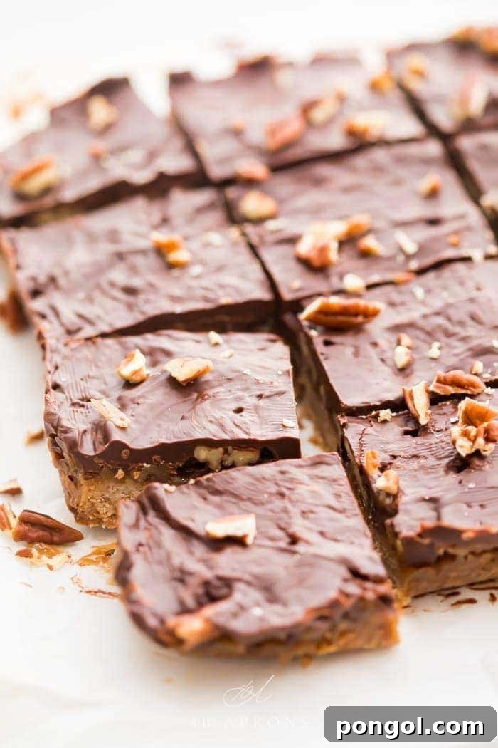 Batch of healthy paleo and vegan turtle bars on parchment paper
