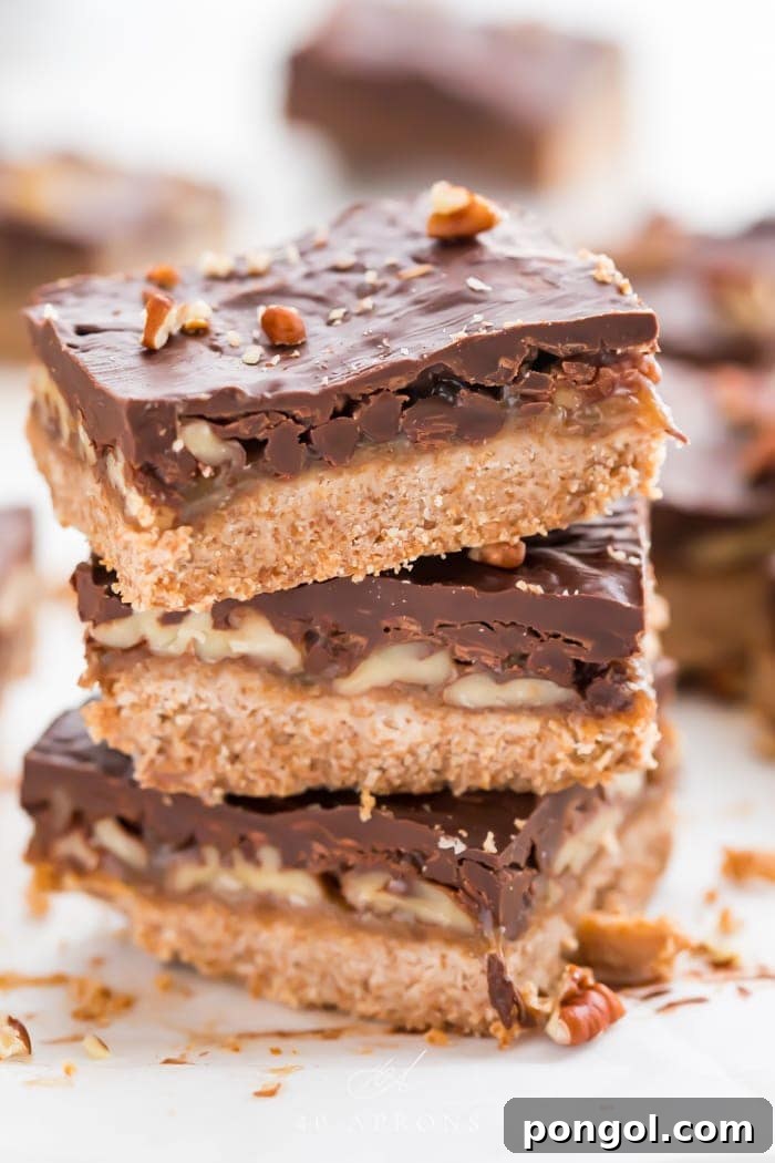 Three healthy paleo and vegan turtle bars stacked on top of each other
