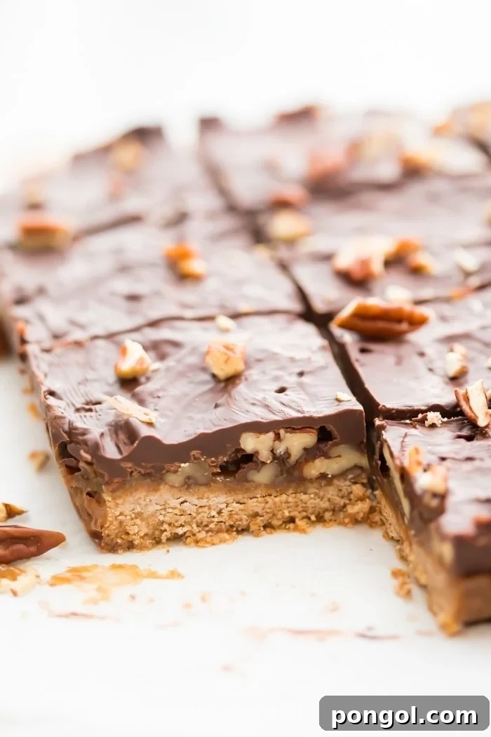 Batch of healthy paleo and vegan turtle bars on parchment paper