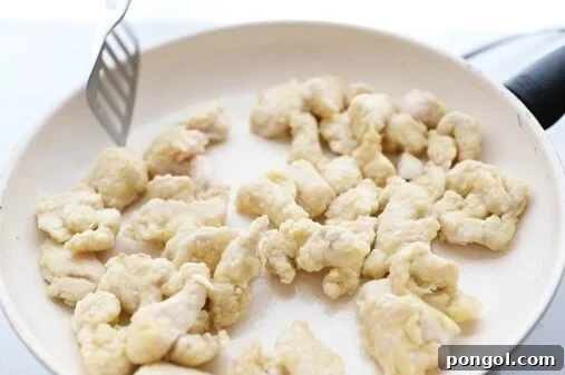 Fry chicken to cook through