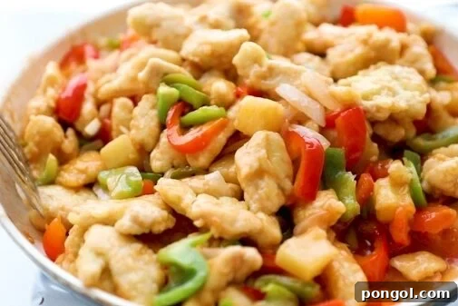 Add sauce and simmer slightly then add chicken and toss to coat