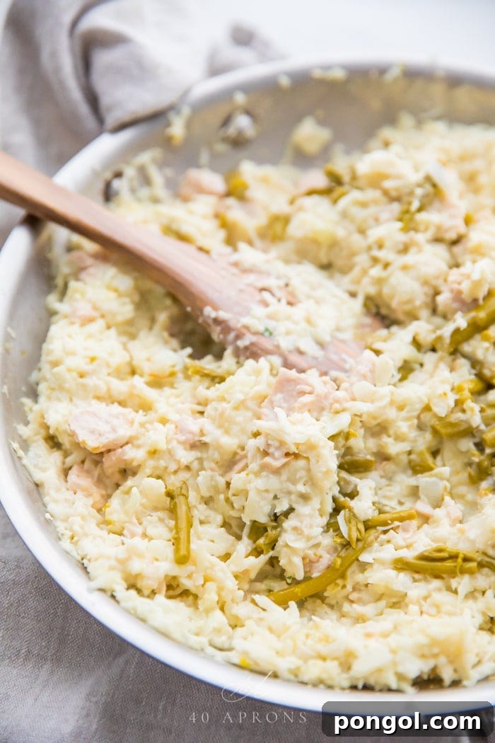 Fold in asparagus and chicken into the Whole30 cauliflower risotto