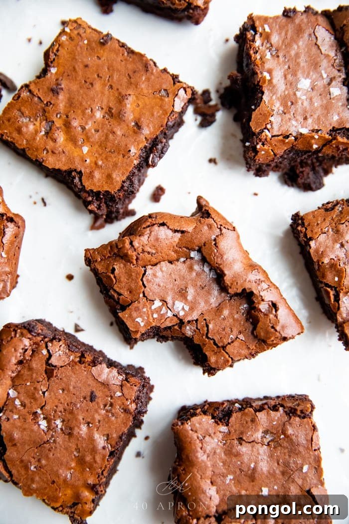 Ultimate Fudgy Crackly Paleo Brownies Gluten Free 3 Close-up of a stack of delicious gluten-free paleo brownies
