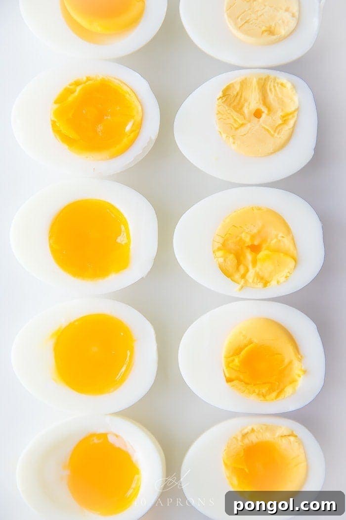 Hard and soft boiled eggs cut in half, showing creamy yolks