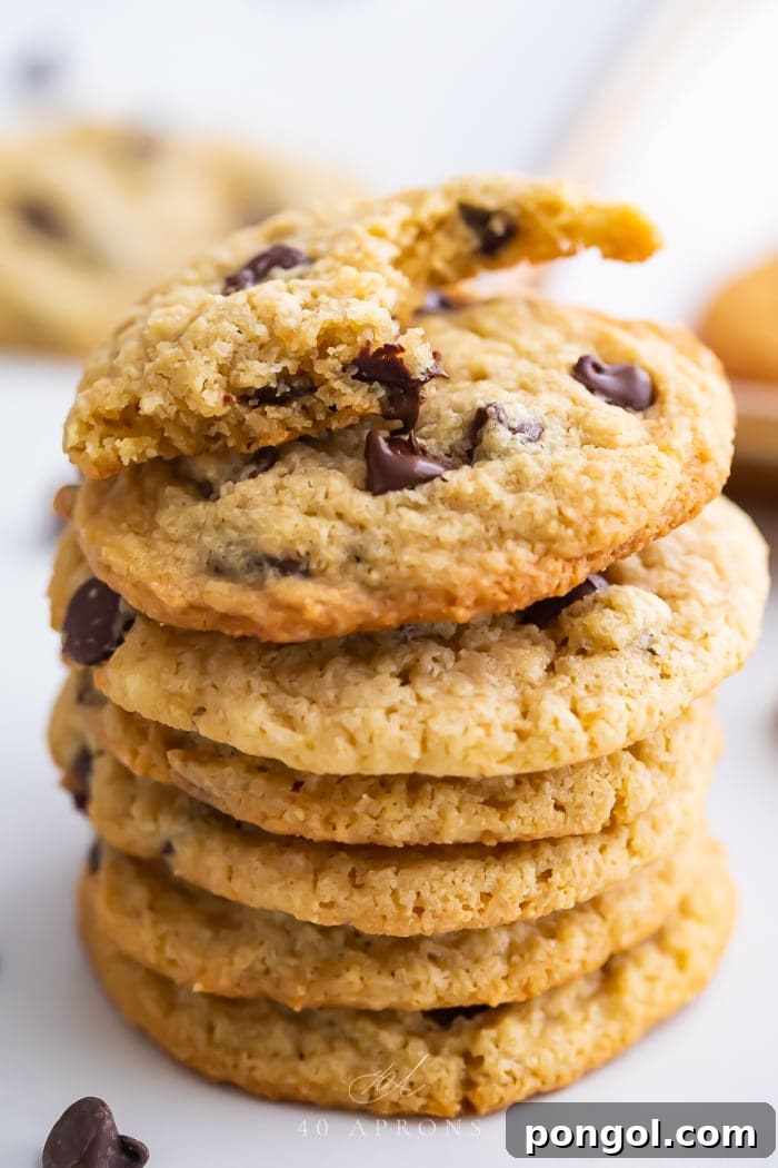 Freshly baked almond flour chocolate chip cookies on a wire rack