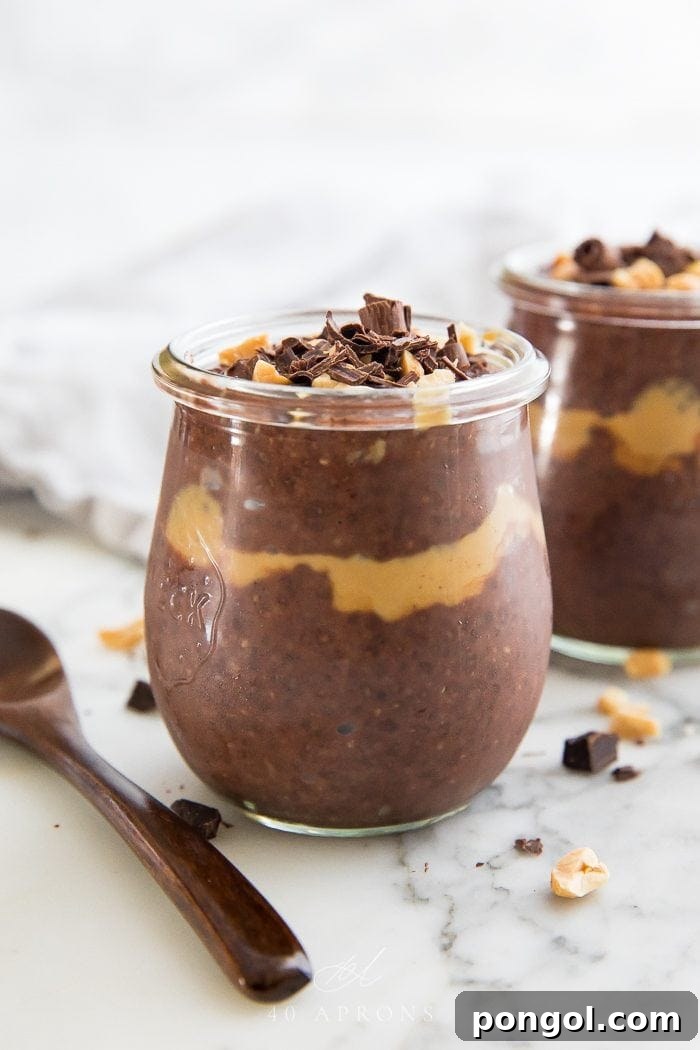 Delicious peanut butter chocolate chia pudding in a clear glass jar, ready to be enjoyed.