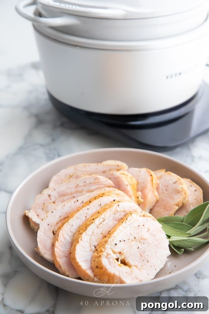 Slices of turkey on a white plate