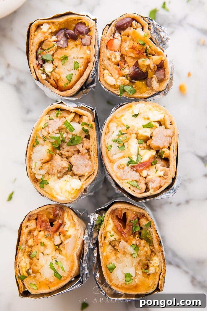 overhead shot of six healthy breakfast burritos filled with sausage, eggs and pico de gallo and vegan breakfast fillings
