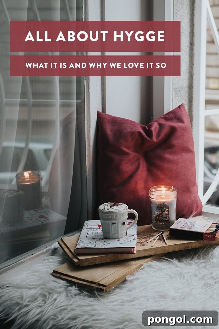 A graphic illustrating Hygge with text: 'All About Hygge', featuring cozy elements like candles and warm drinks