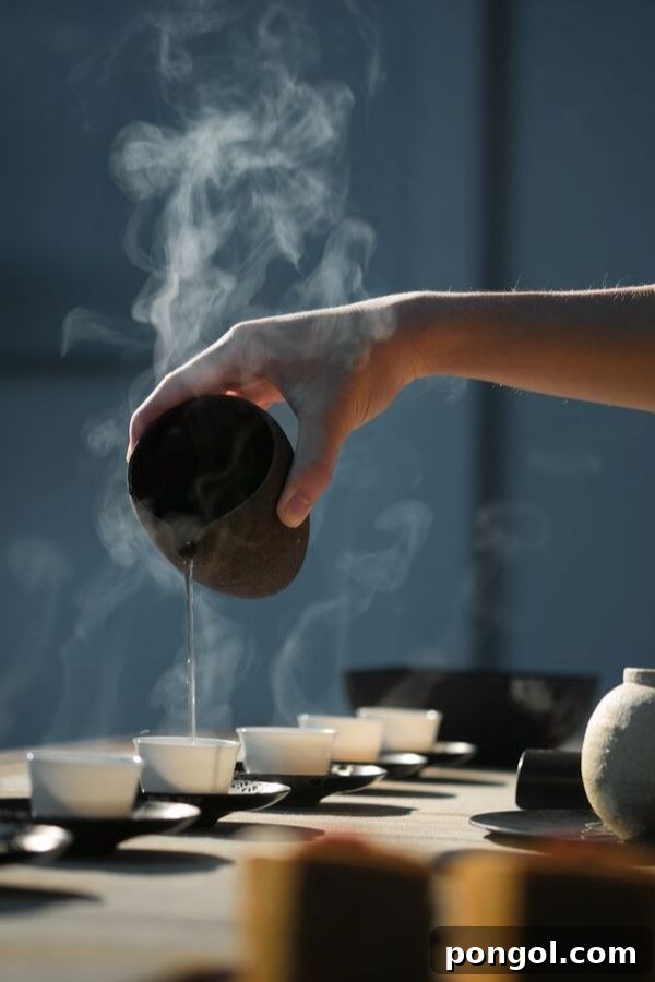 Steaming hot adaptogenic tea being poured into elegant white tea glasses, evoking a sense of calm and ritual.