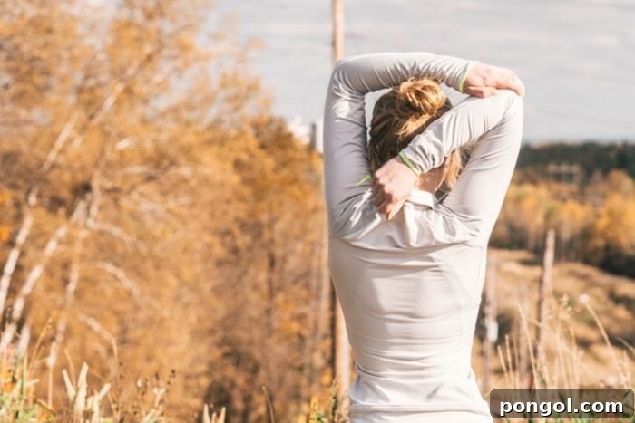 a blonde woman stretching before going on a run 