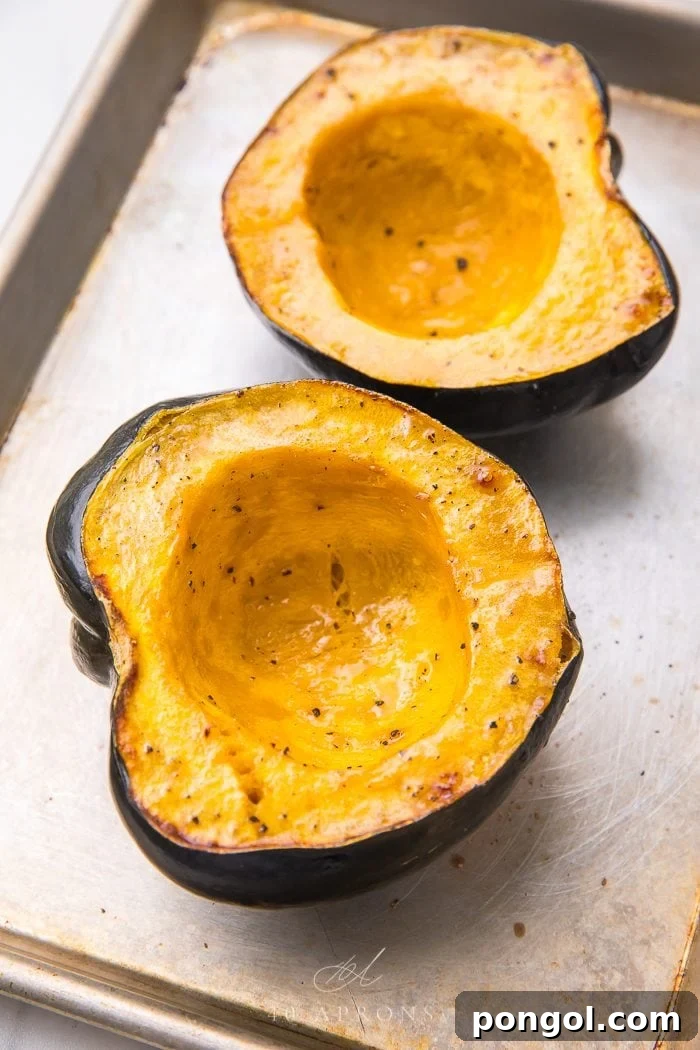 Beautifully baked acorn squash halves garnished and ready to be served