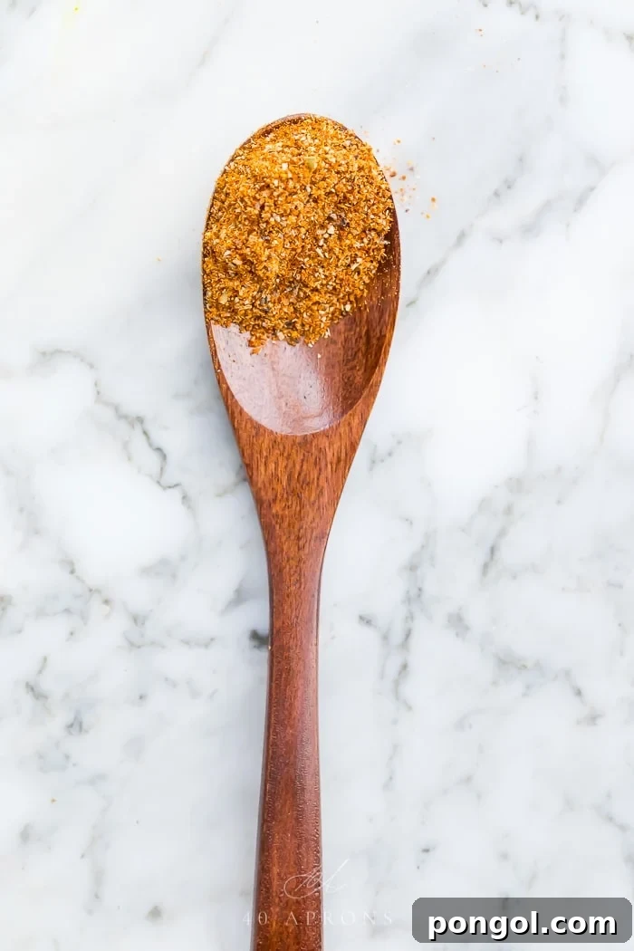 Spice mix on a wooden spoon