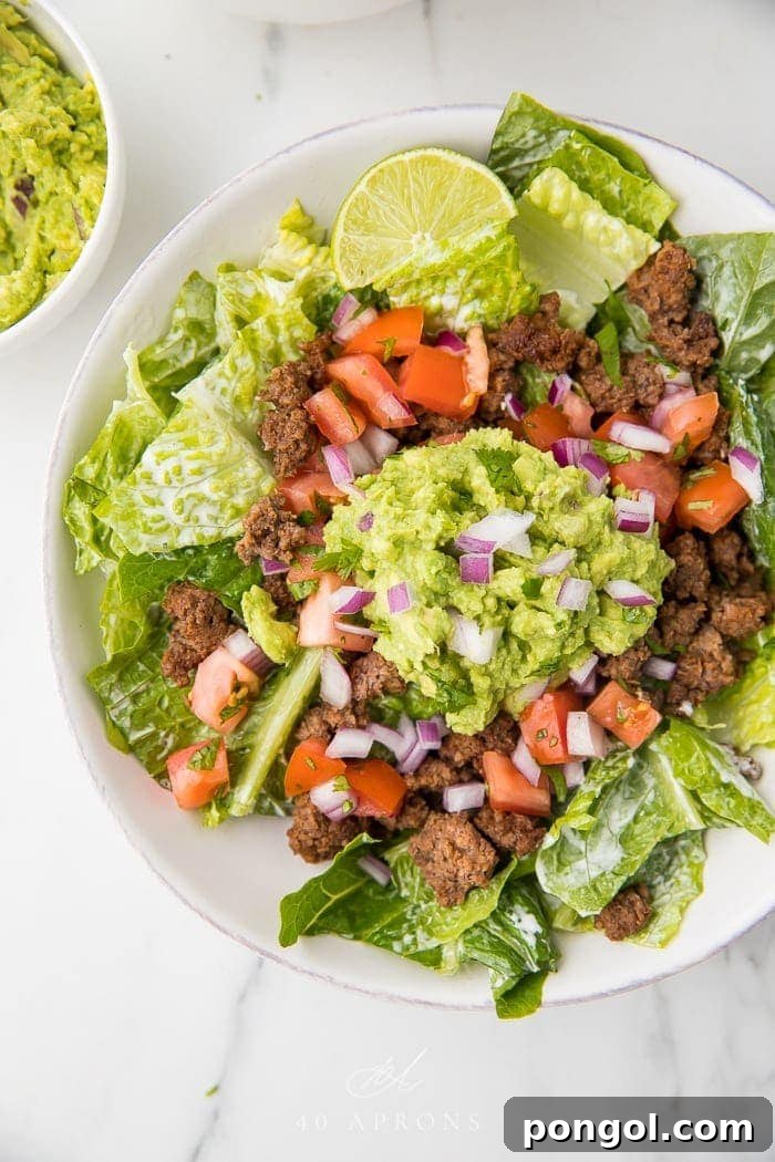 A vibrant and healthy taco salad served in a bowl, ready to be enjoyed.