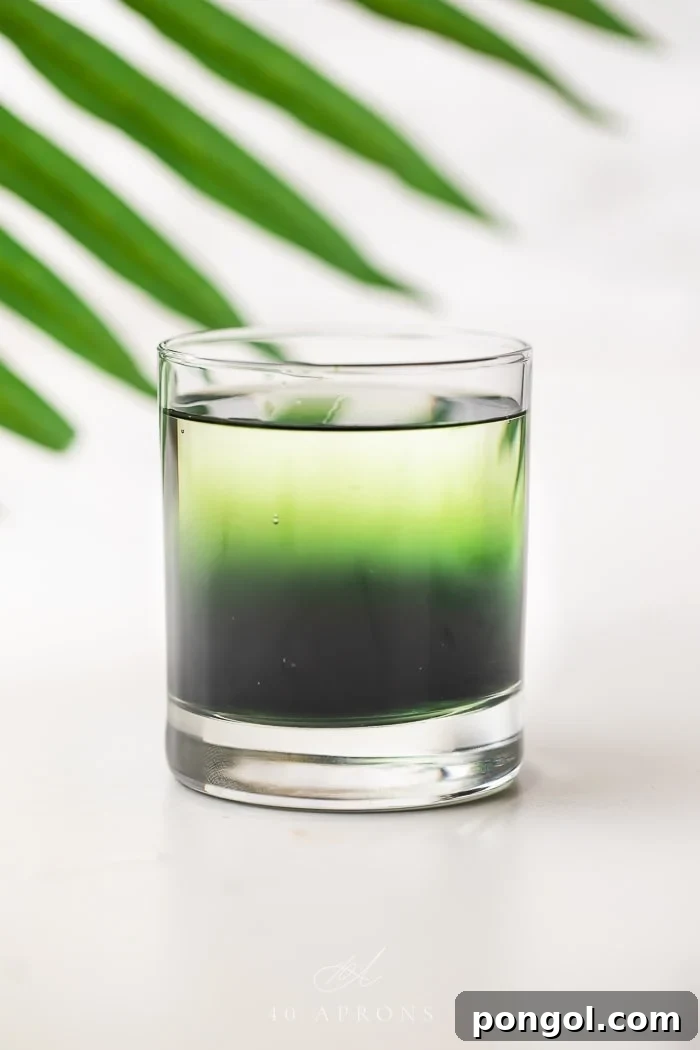 Green chlorophyll water in a glass