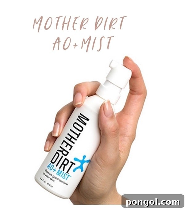 A bottle of Mother Dirt AO+ Mist, a clean beauty essential, perfect for refreshing skin post-workout.