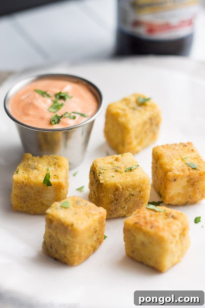 Crispy Tofu "Chicken" Nuggets with Sriracha Mayo 3 Close-up of golden brown Tofu Chicken Nuggets