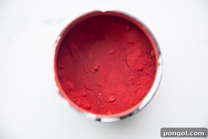 Beet powder in a white mug