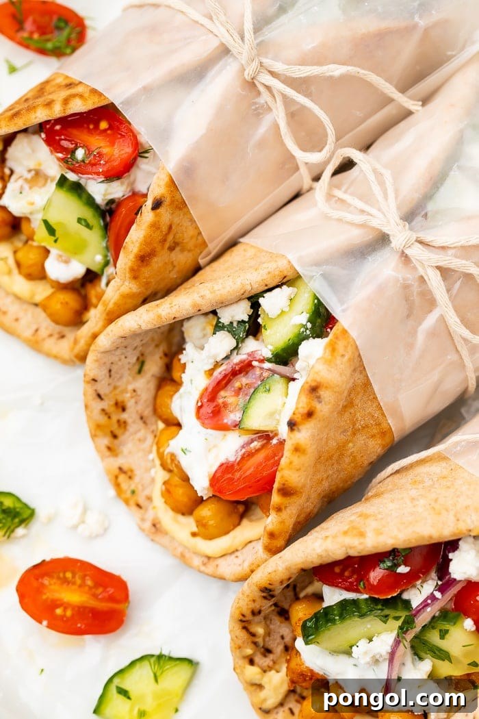 Gyros wrapped in wax paper and tied with string