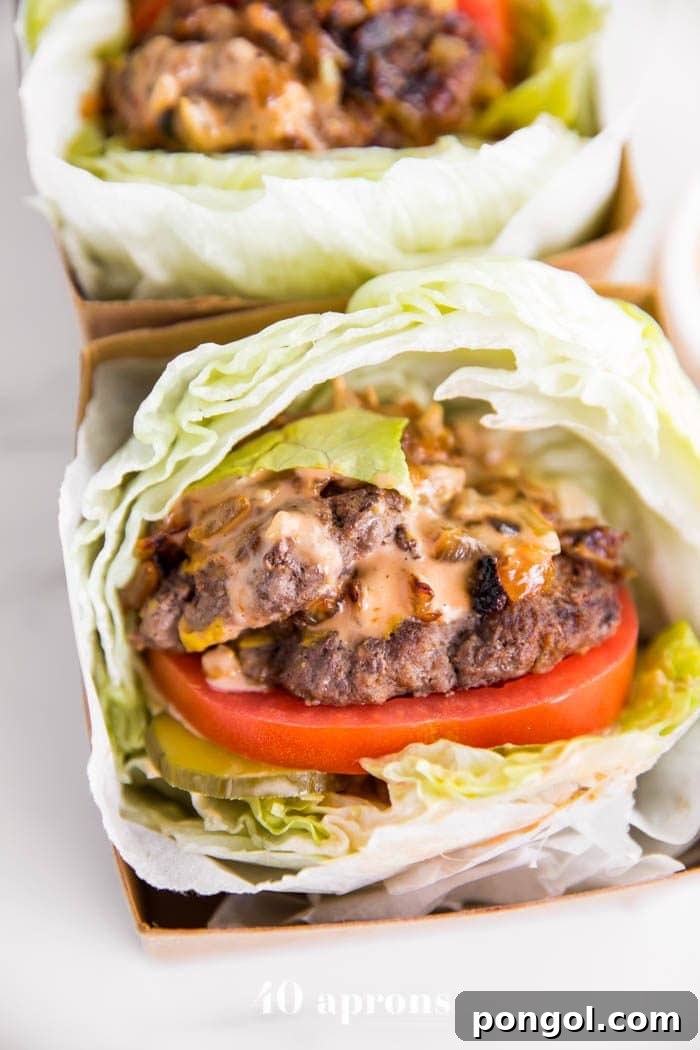 Flavorful Whole30 Dinner Ideas 28 Whole30 In-N-Out double-double animal style burgers served in lettuce buns.