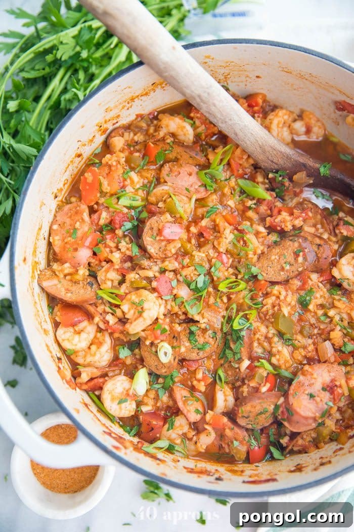 Flavorful Whole30 Dinner Ideas 45 A large pot of Whole30 healthy jambalaya with cauliflower rice.