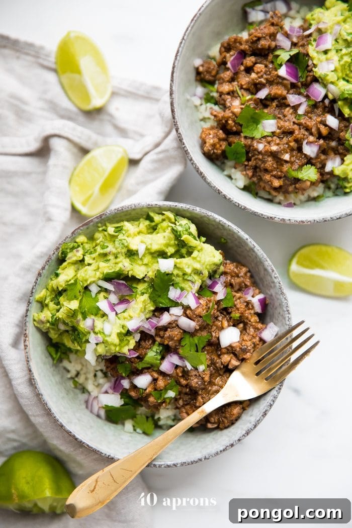 Flavorful Whole30 Dinner Ideas 31 Whole30 Chipotle beef & avocado bowls served over cilantro-lime cauliflower rice.