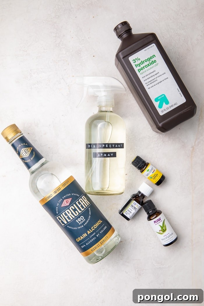 Ingredients for DIY disinfectant (Lysol spray) on a white board