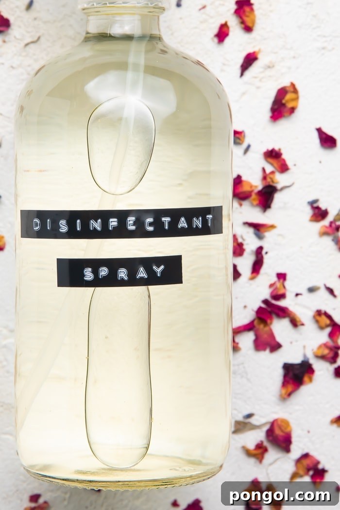 Close up of bottle with "disinfectant spray" label on it