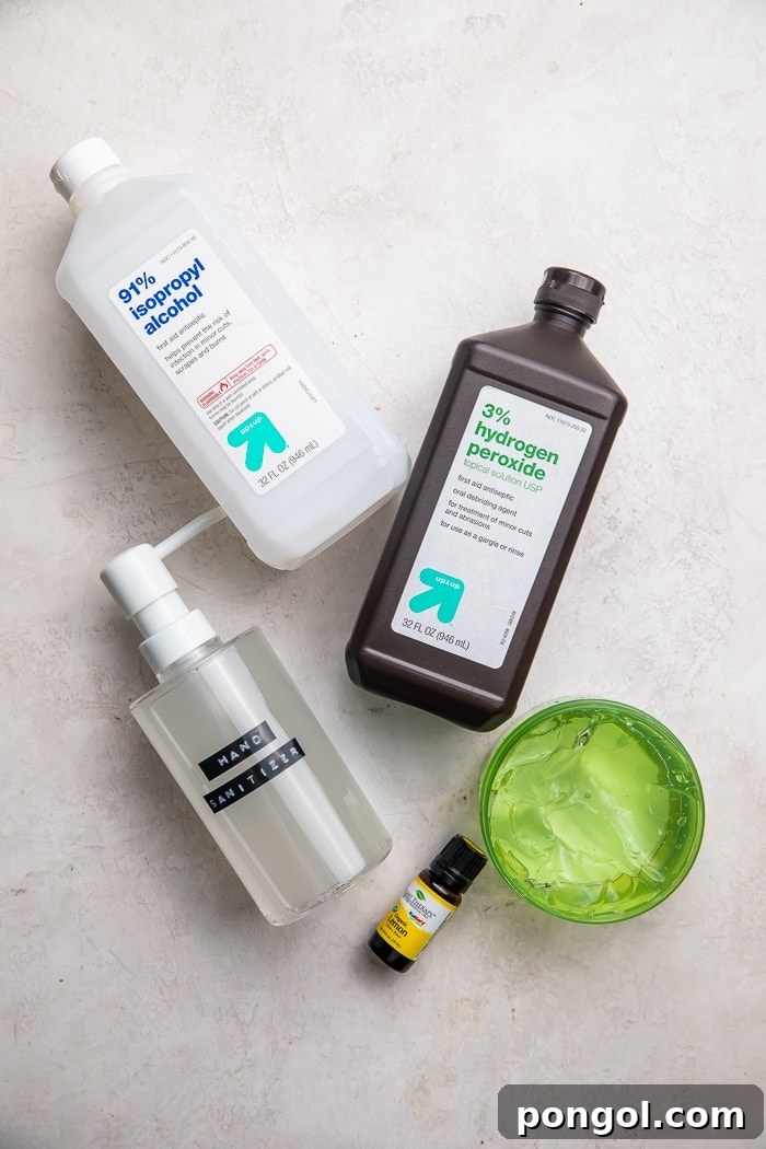 Easy Homemade Hand Sanitizer 4 All the simple ingredients for making DIY hand sanitizer displayed neatly on a white background, emphasizing ease of preparation.