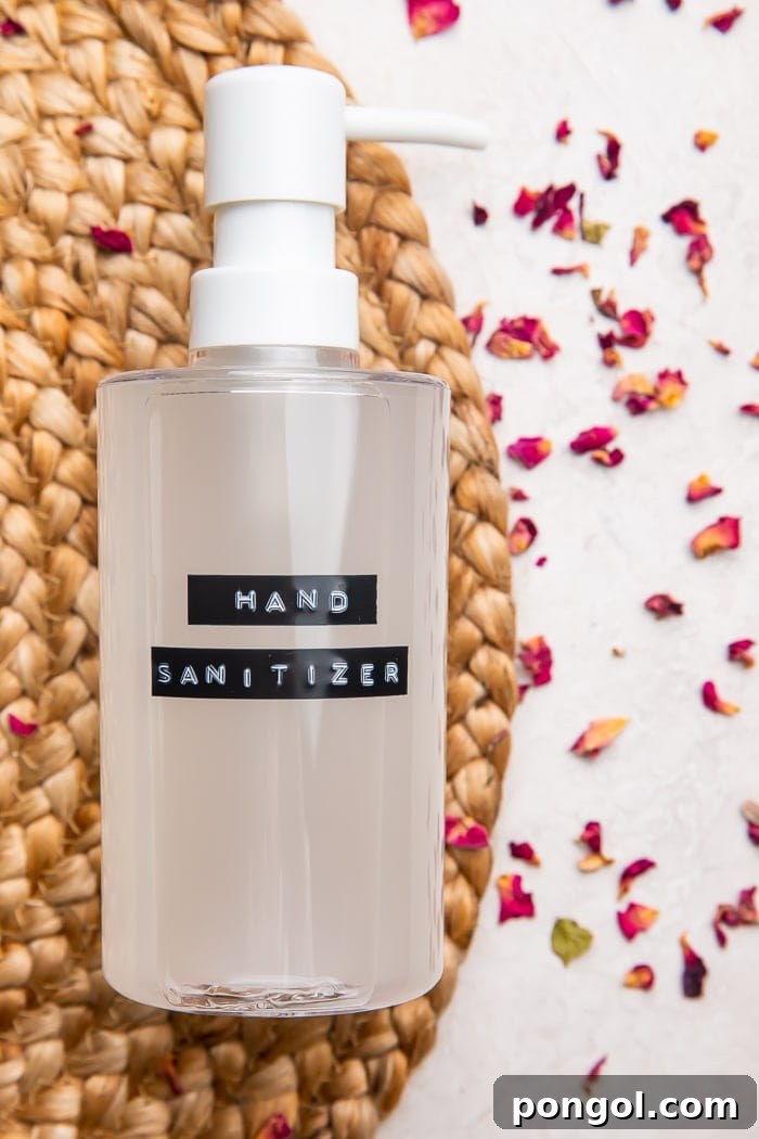 Easy Homemade Hand Sanitizer 7 A sleek bottle of homemade hand sanitizer adorned with a minimalist black label, symbolizing quality and thoughtful creation.