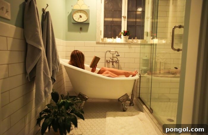 A relaxing bath with candles, a book, and chocolate, symbolizing indulgent self-care