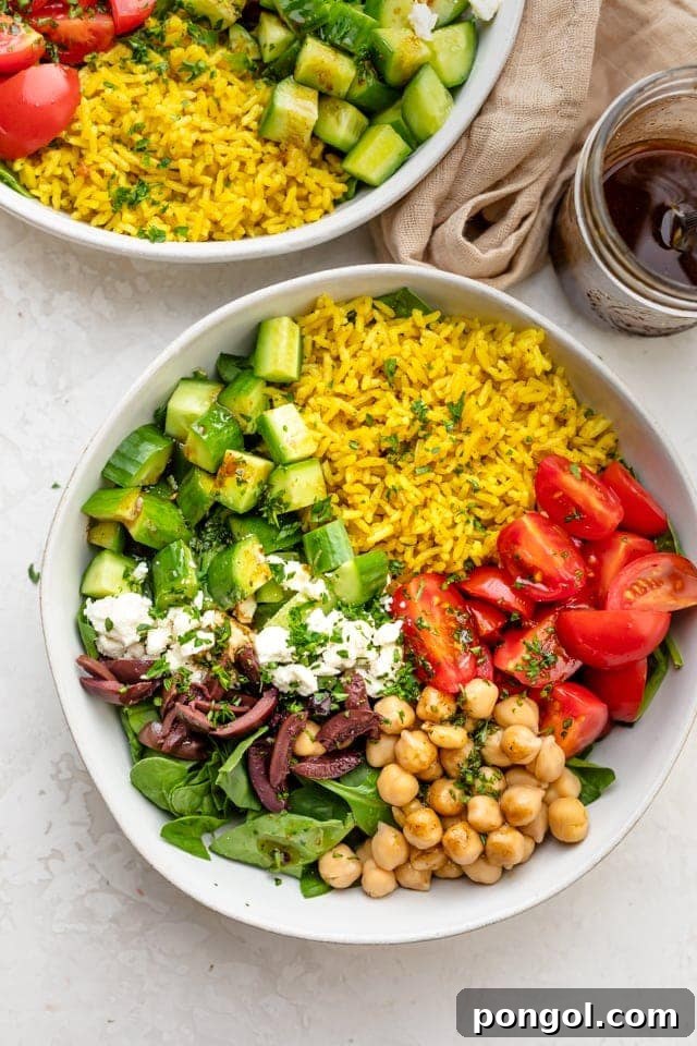 A vibrant turmeric rice salad, colorful with fresh vegetables and herbs, offering a healthy and refreshing meal option.