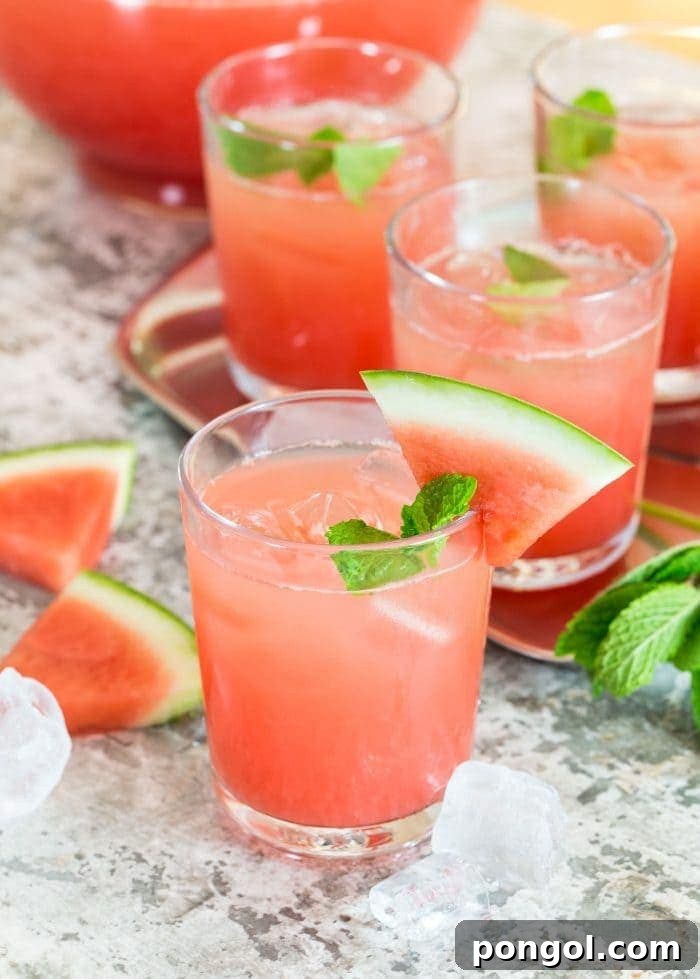 Several glasses of refreshing Blueberry Mojitos, elegantly garnished with fresh blueberries and verdant mint sprigs, promising a delightful summer sip.