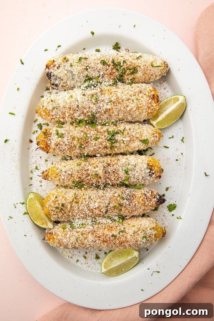 Elotes on a plate, ready to be enjoyed, showcasing the vibrant colors and creamy textures.