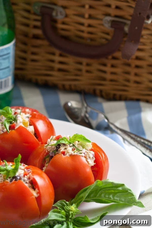 A fresh and colorful Greek Tuna Salad with feta, olives, and bell peppers.