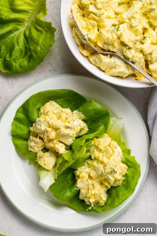 Keto egg salad on two pieces of lettuce ready to serve