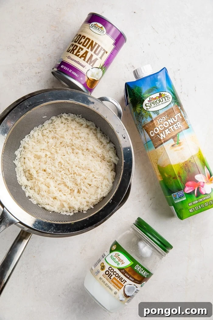 Cooking coconut rice in a saucepan