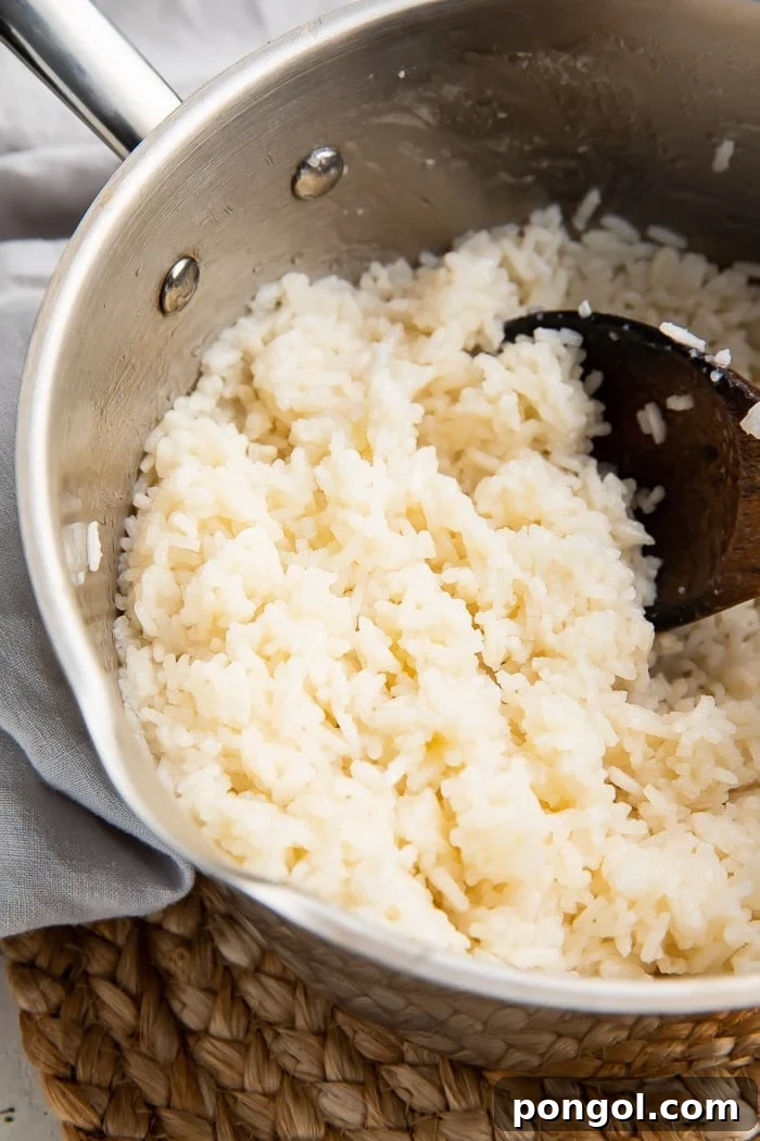 Coconut rice cooking on the stovetop