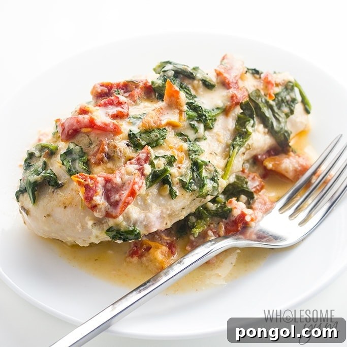 Creamy, bubbling Slow Cooker Buffalo Chicken Dip topped with fresh green onions.