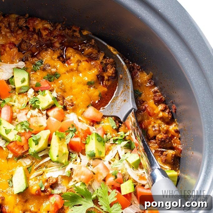 An inviting overhead shot of a delicious and easy keto meal prepared in a slow cooker.