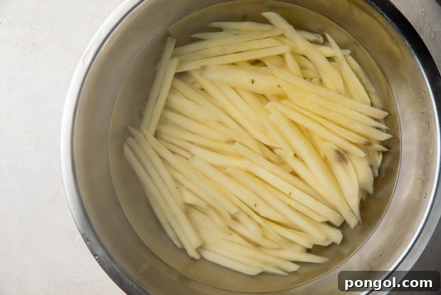 Step 3: Blanching and drying potatoes.