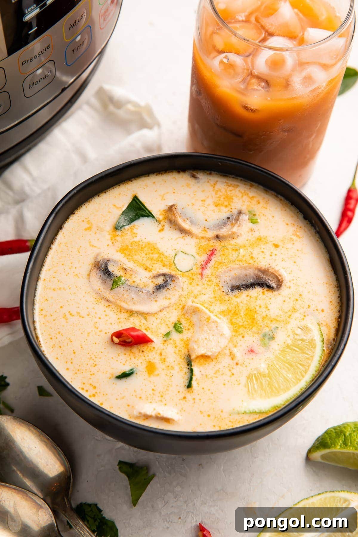 Instant Pot tom kha soup in a large black bowl