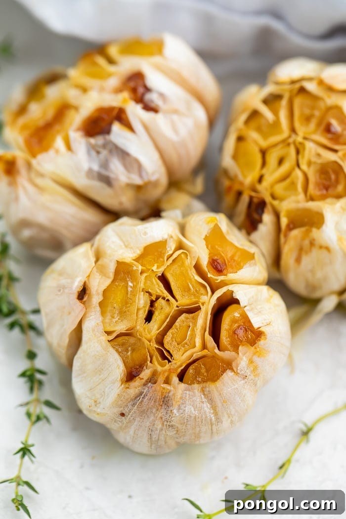 Mastering the Art of Roasting Garlic 3 Close-up of roasted garlic on a sheet of aluminum foil